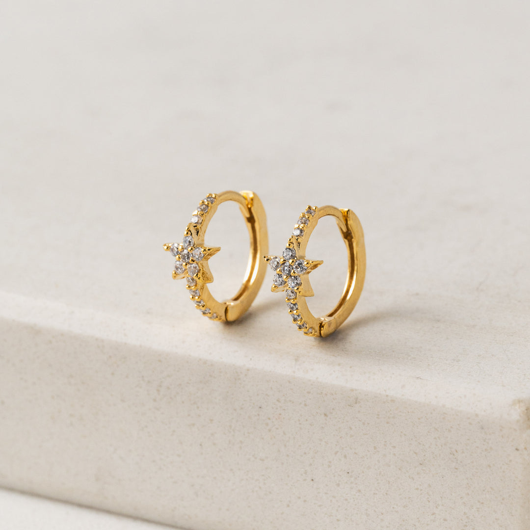 gold  star huggie hoop earrings