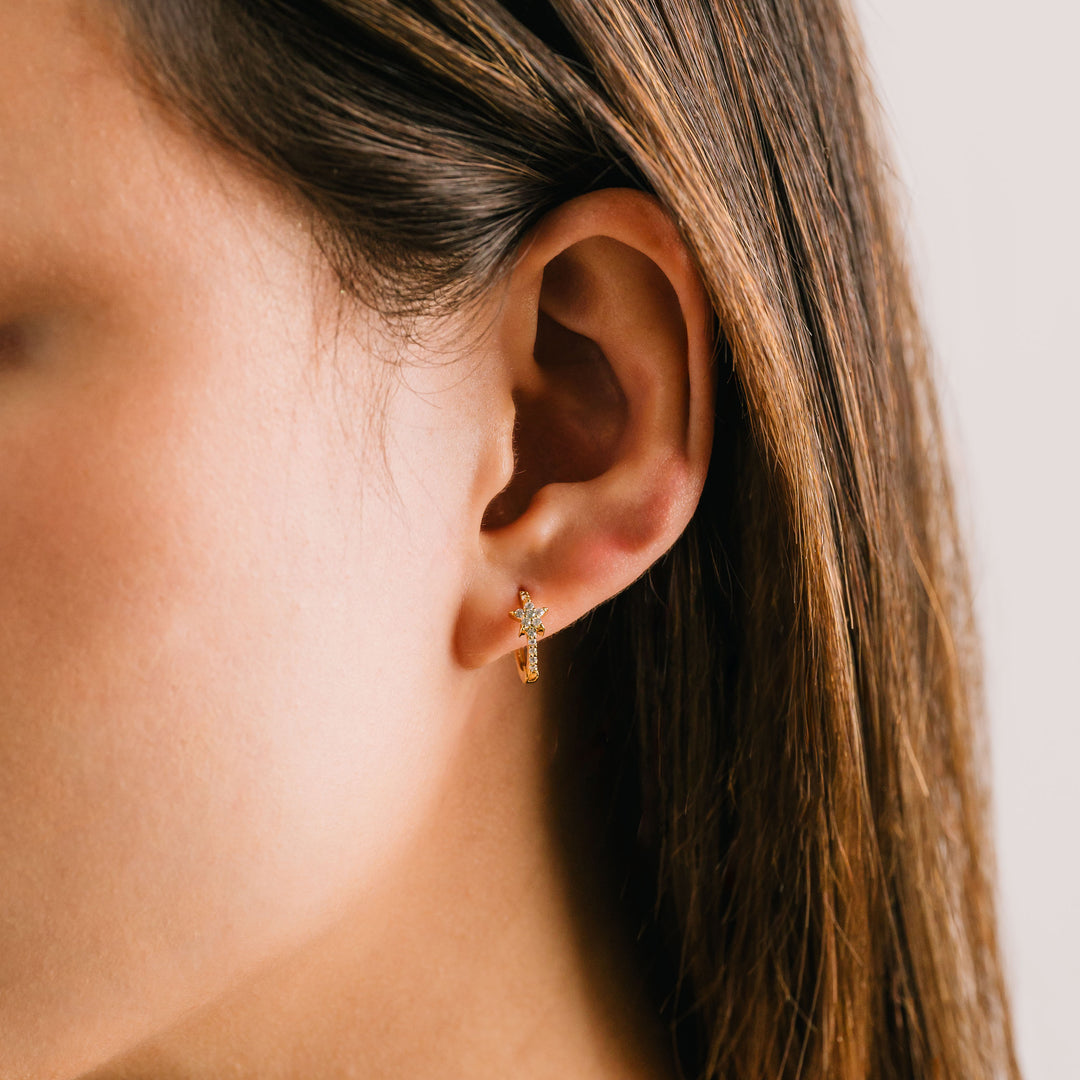 gold  star huggie hoop earrings