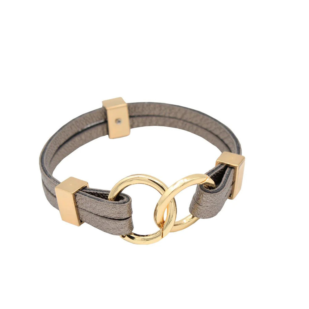 Bracelet with gold clasps and gray fabric on a white background