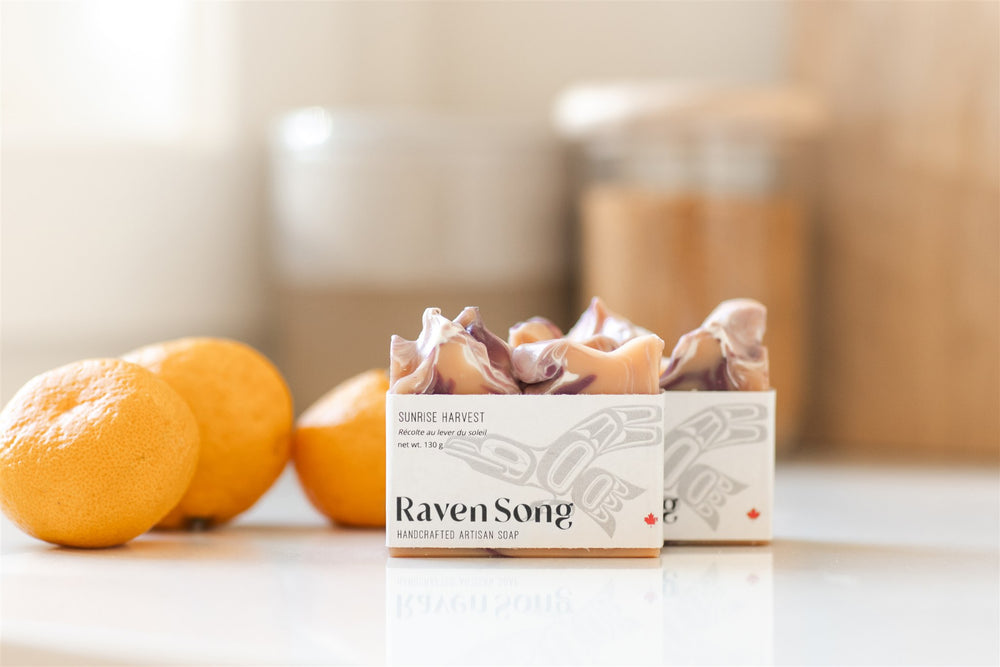 RavenSong Soap & Candle Sunrise Harvest Artisan Citrus and Patchouli Hand Soap with natural citrus slices and patchouli leaves