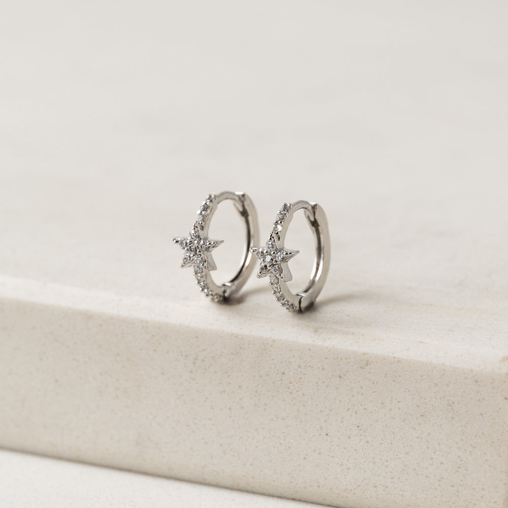 silver star huggie hoop earrings