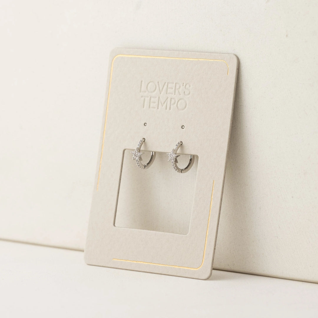 silver star huggie hoop earrings