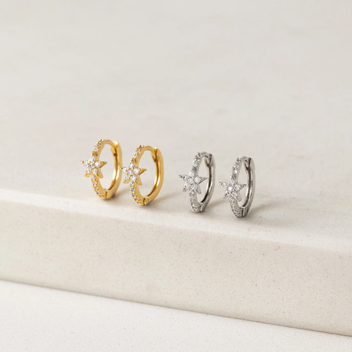 silver star huggie hoop earrings