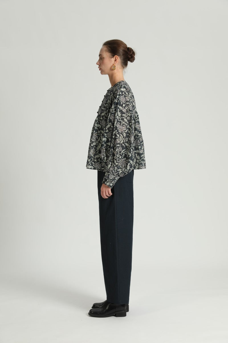 See U Soon Tarik Block Print Floral Peasant Blouse with long sleeves and a relaxed fit, showcasing vibrant floral patterns.