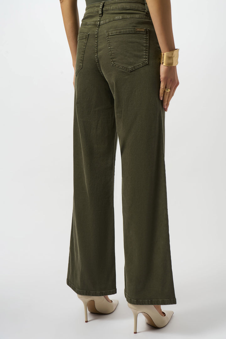 woman wearing dark green denim jeans with flare style