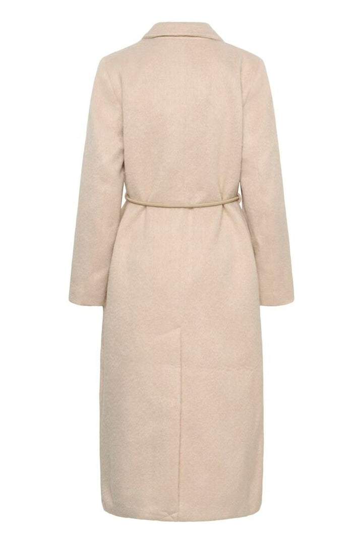Beige coat on a white background